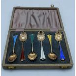 A CASED SET OF DANISH DAVID ANDERSEN SILVER AND ENAMEL SPOONS. 61 grams. 10 cm x 2 cm. (6)