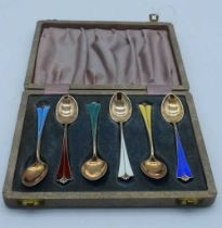 A CASED SET OF DANISH DAVID ANDERSEN SILVER AND ENAMEL SPOONS. 61 grams. 10 cm x 2 cm. (6)