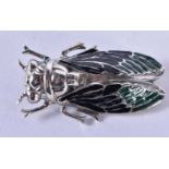 A SILVER AND ENAMEL BUG BROOCH. 13.3 grams. 5 cm x 3 cm.