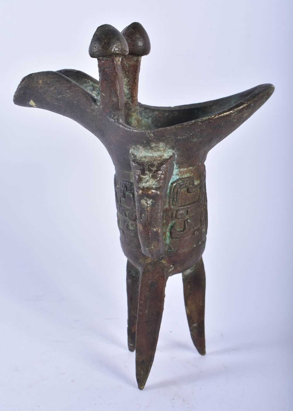 A CHINESE QING DYNASTY BRONZE JUE BRONZE WINE VESSEL. 19 cm high. - Image 3 of 7