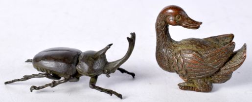 A Japanese bronze Rhinoceros Beetle together with a duck cm (2).