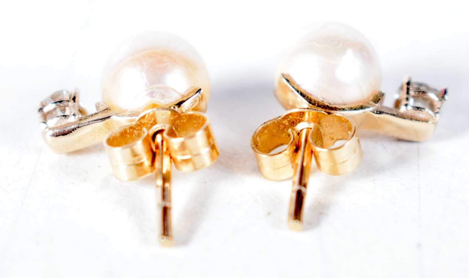 A Cased Pair of Diamond and Pearl Earrings. 1.1cm x 0.7cm, weight 2.1g - Image 2 of 3