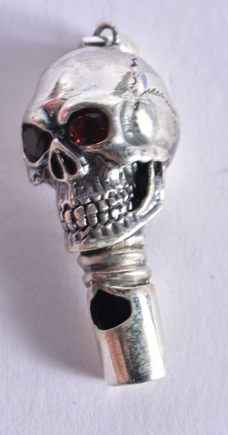 A Silver Skull Whistle Pendant. Stamped 925 Sterling, 4.9cm x 1.6 cm x 1.8 cm, weight 16.4g