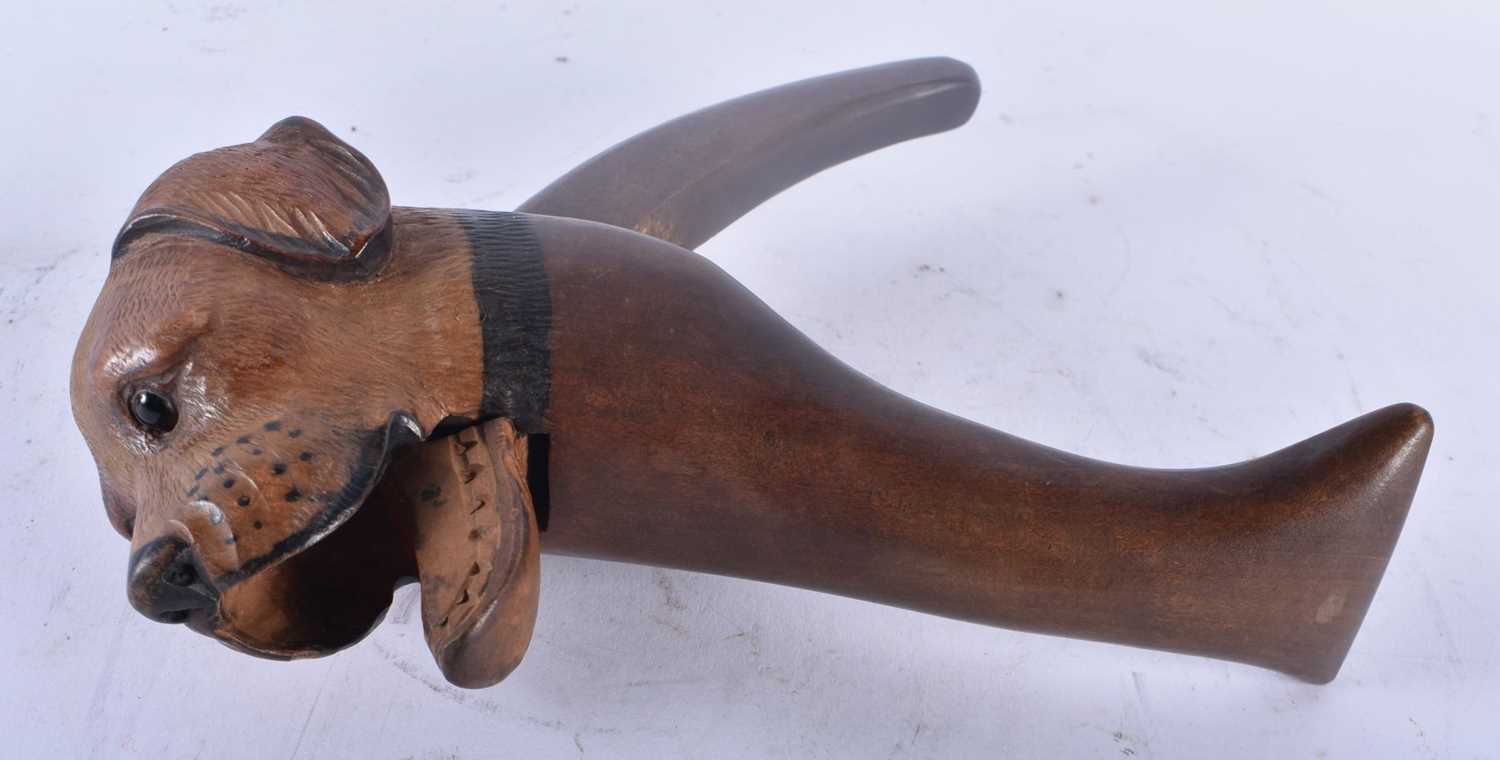 A PAIR OF 19TH CENTURY BAVARIAN BLACK FOREST CARVED WOOD DOG NUTCRACKERS. 19 cm high. - Image 3 of 3