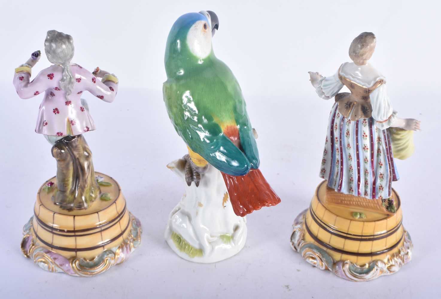 A MEISSEN PORCELAIN FIGURE OF A PARROT together with a pair of Continental figures. Largest 15 cm - Image 2 of 4