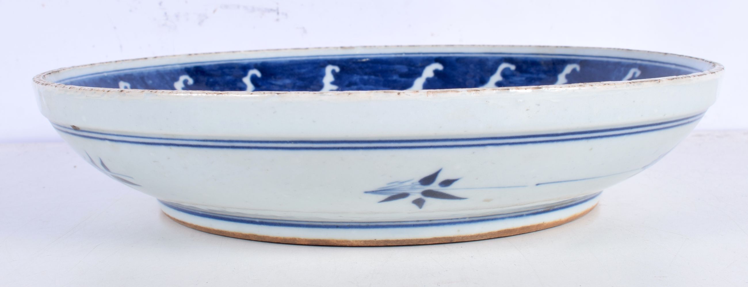 A Chinese Porcelain blue and white dish decorative with a figure riding ab fish 6 x 29 cm. - Image 5 of 6