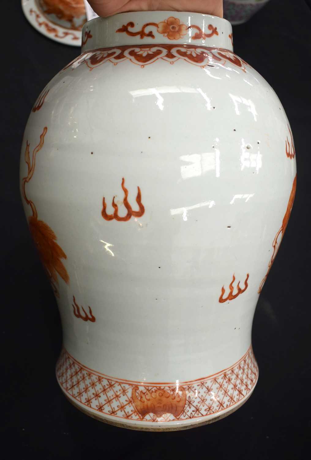 A LARGE PAIR OF CHINESE QING DYNASTY IRON RED PAINTED GINGER JARS AND COVERS painted with buddhistic - Image 7 of 26