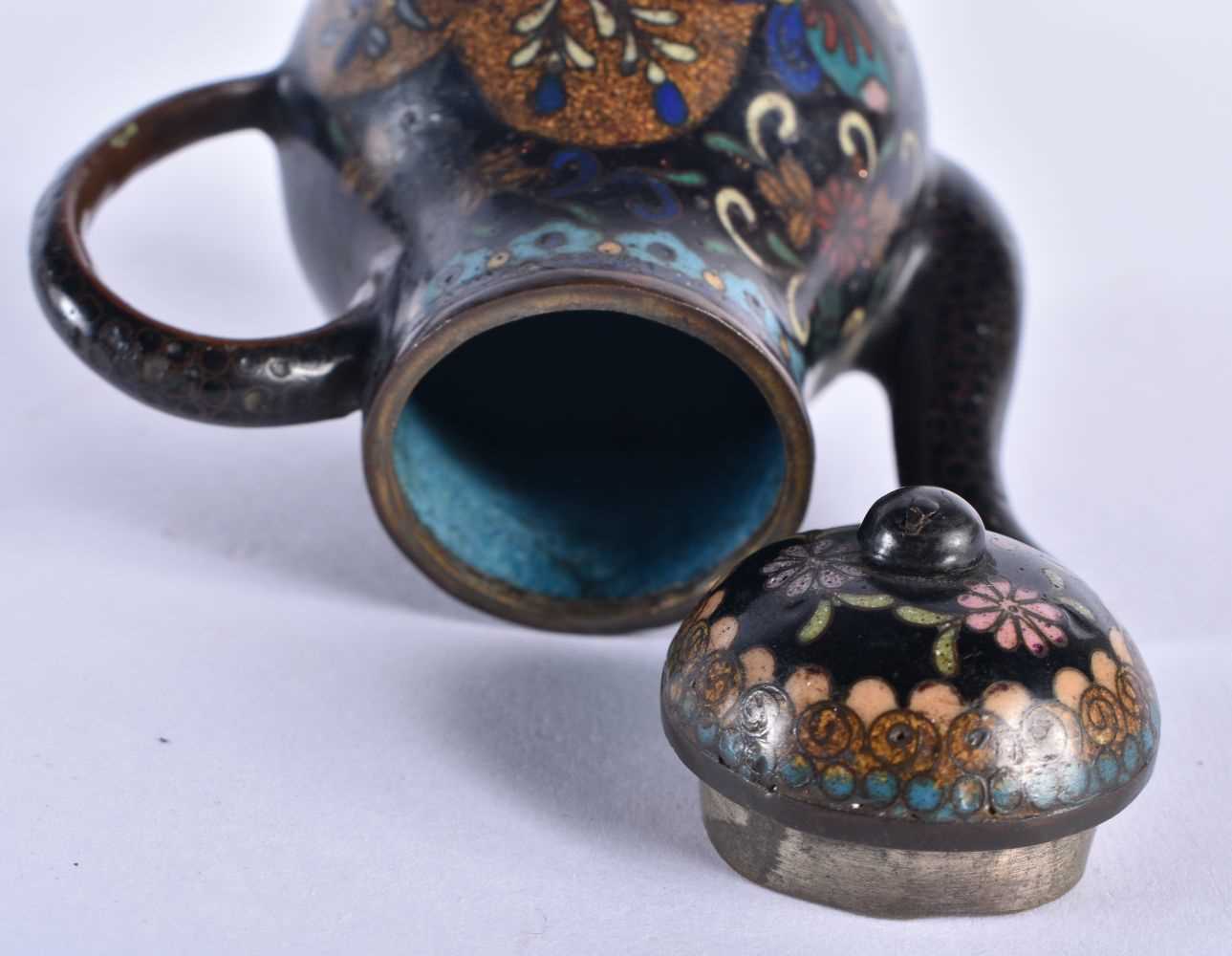 A 19TH CENTURY JAPANESE MEIJI PERIOD CLOISONNE ENAMEL TEAPOT AND COVER decorated with foliage. 9 - Image 4 of 5