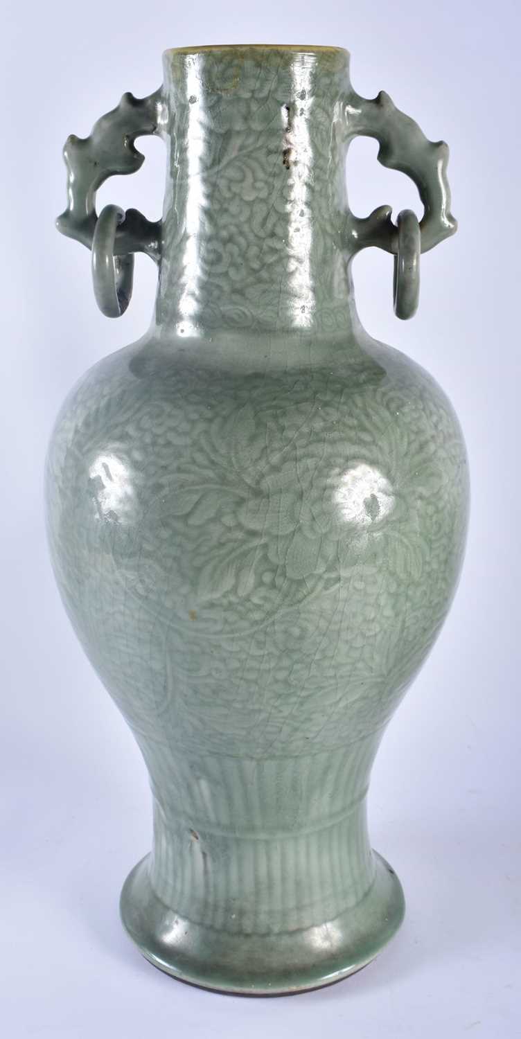 A LARGE 18TH/19TH CENTURY CHINESE TWIN HANDLED CELADON VASE decorated with foliage and vines. 54 - Image 3 of 12