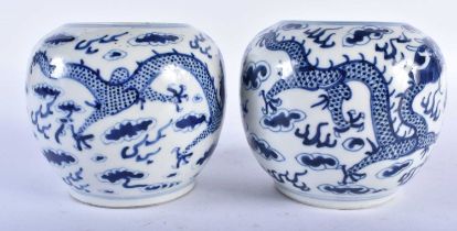 A PAIR OF 19TH CENTURY CHINESE BLUE AND WHITE PORCELAIN GLOBULAR CENSERS bearing Kangxi marks to