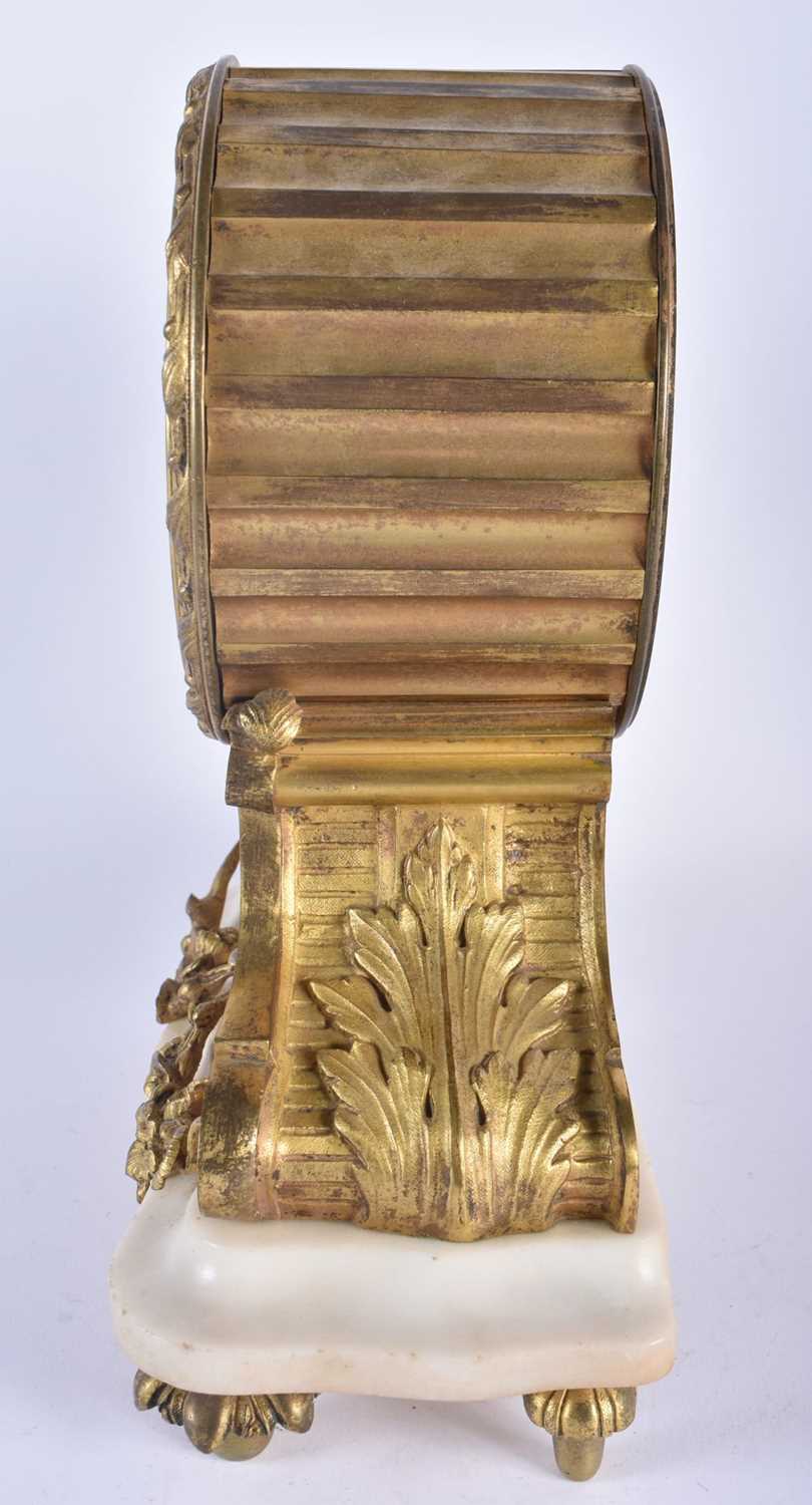 A 19TH CENTURY FRENCH ORMOLU AND SEVRES PORCELAIN MANTEL CLOCK supported upon a white marble base. - Image 4 of 7