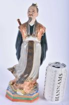 A CHINESE REPUBLICAN PERIOD BISQUE AND ENAMELLED PORCELAIN FIGURE OF A MALE. 30cm high.