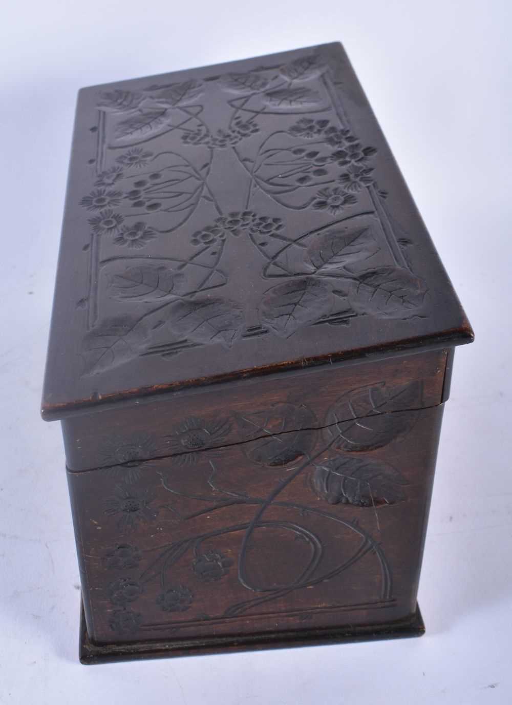 A LARGE ART NOUVEAU CARVED WOOD STATIONARY BOX decorated all over with flowers and trailing vines. - Image 4 of 4