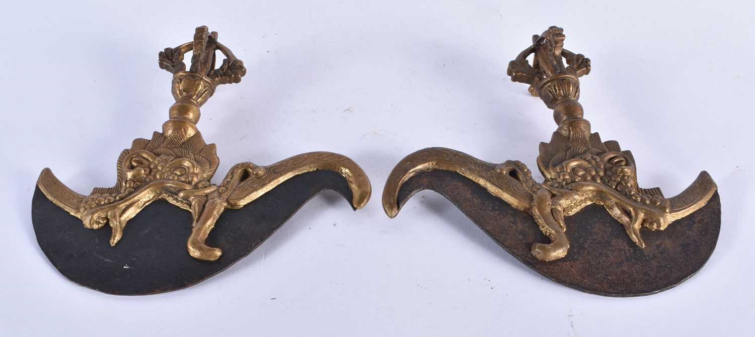 A PAIR OF 19TH CENTURY TIBETAN BRONZE DRAGON BEAST VAJRA KNIVES. 15 cm x 17 cm.