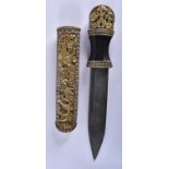 AN UNUSUAL 18TH/19TH CENTURY CHINESE TIBETAN GILT REPOUSSE DAGGER decorated in relief with dragons