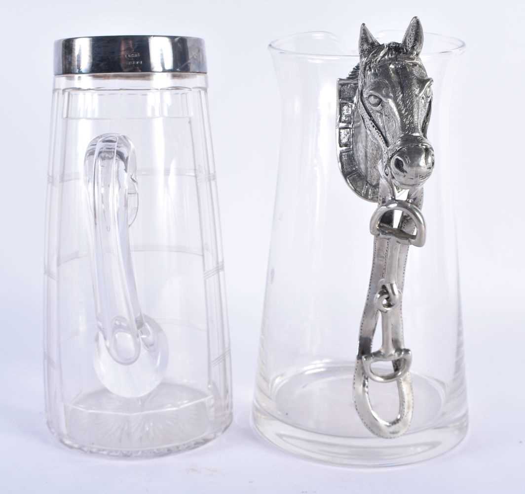 A SILVER PLATED GLASS PITCHER together with a horse head jug. Largest 22 cm x 17 cm. (2) - Image 2 of 5