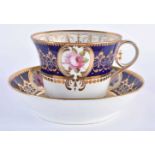 Chamberlain’s Worcester fine breakfast cup and saucer painted with four gilt floral panels on a blue