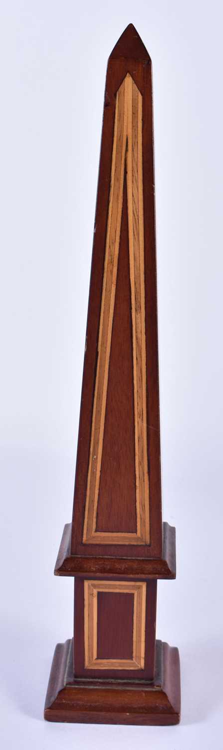 A GEORGE III STYLE MAHOGANY OBELISK. 30cm high.