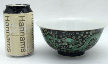 A Chinese porcelain Famille Noire Dragon bowl 7.5 x 16 cm.