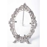 An Ornate Oval Continental Silver Desk Photo Frame. Stamped 800. 9.5 cm x 6.7cm, weight 44.7g (