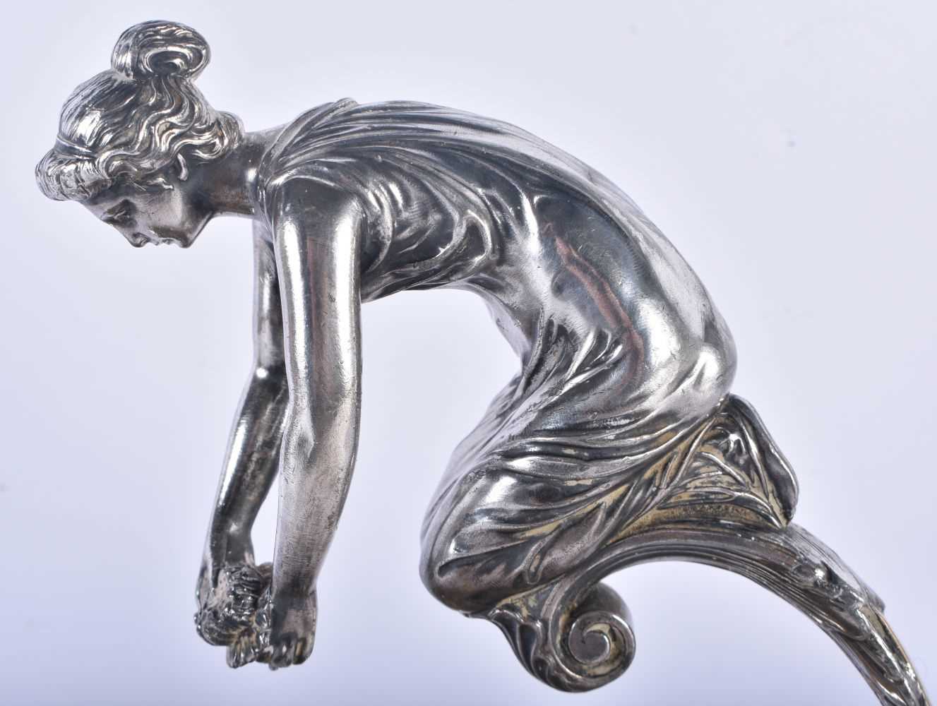 AN UNUSUAL WMF SILVER PLATED DECANTER AND GLASS STAND formed with a leaning female. 24 cm x 18cm. - Image 2 of 8