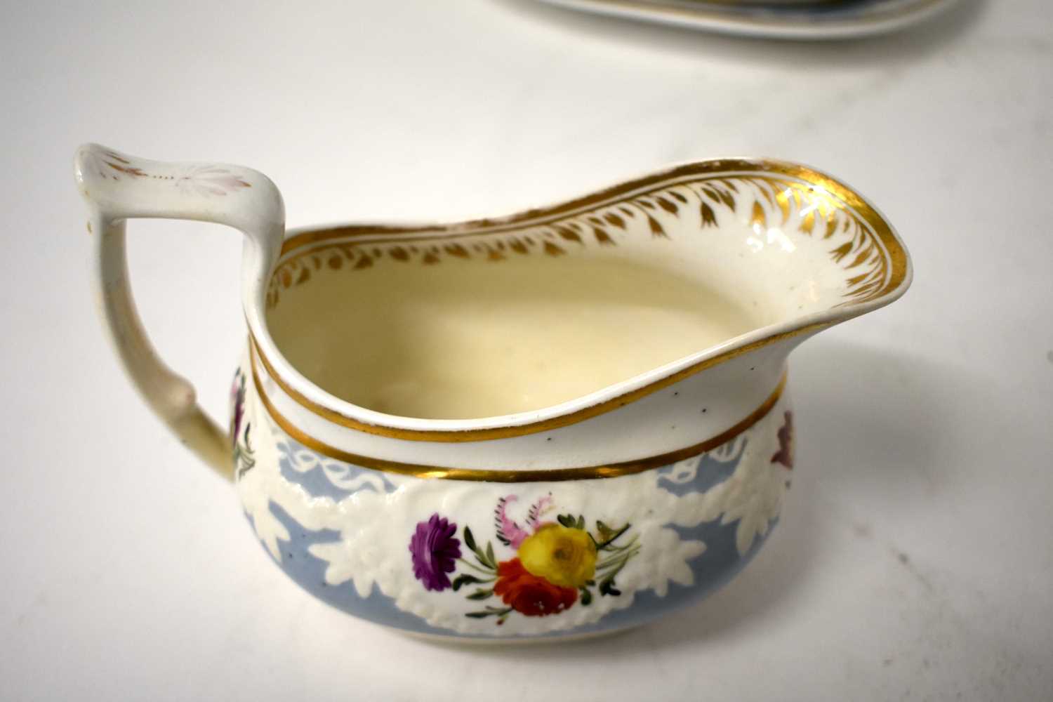 AN EARLY 19TH CENTURY CHAMBERLAINS WORCESTER PART TEASET painted with floral sprays, under a moulded - Image 28 of 36