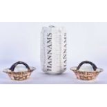 A PAIR OF MINIATURE ROYAL CROWN DERBY IMARI BASKETS. 7 cm wide.