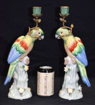 A pair of Ormolu mounted porcelain parrot candlesticks 36 cm (2)