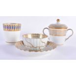 Caughley teabowl and saucer with Gilt Queens pattern, a similar chocolate cup and cover and a beaker