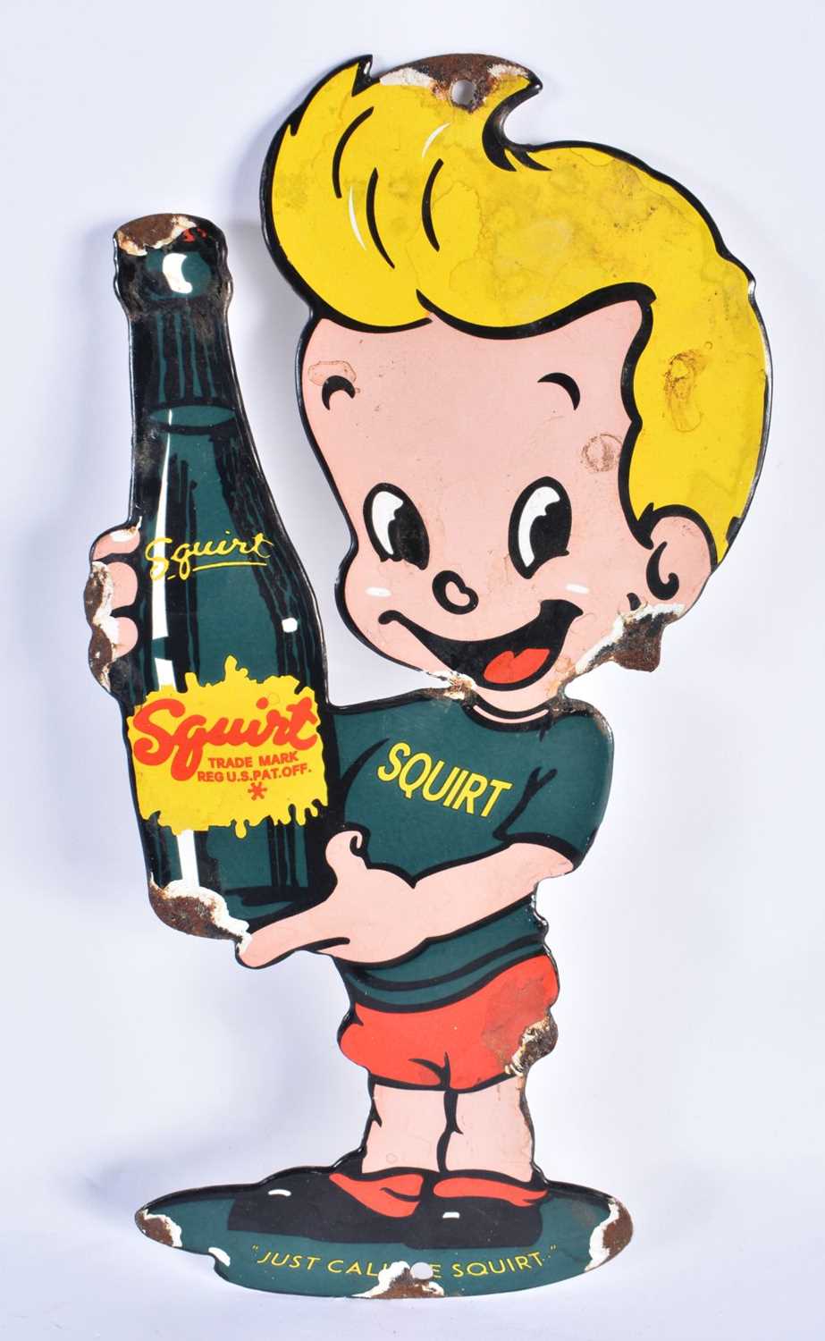 A SQUIRT ADVERTISING SIGN. 30cm x 14 cm.