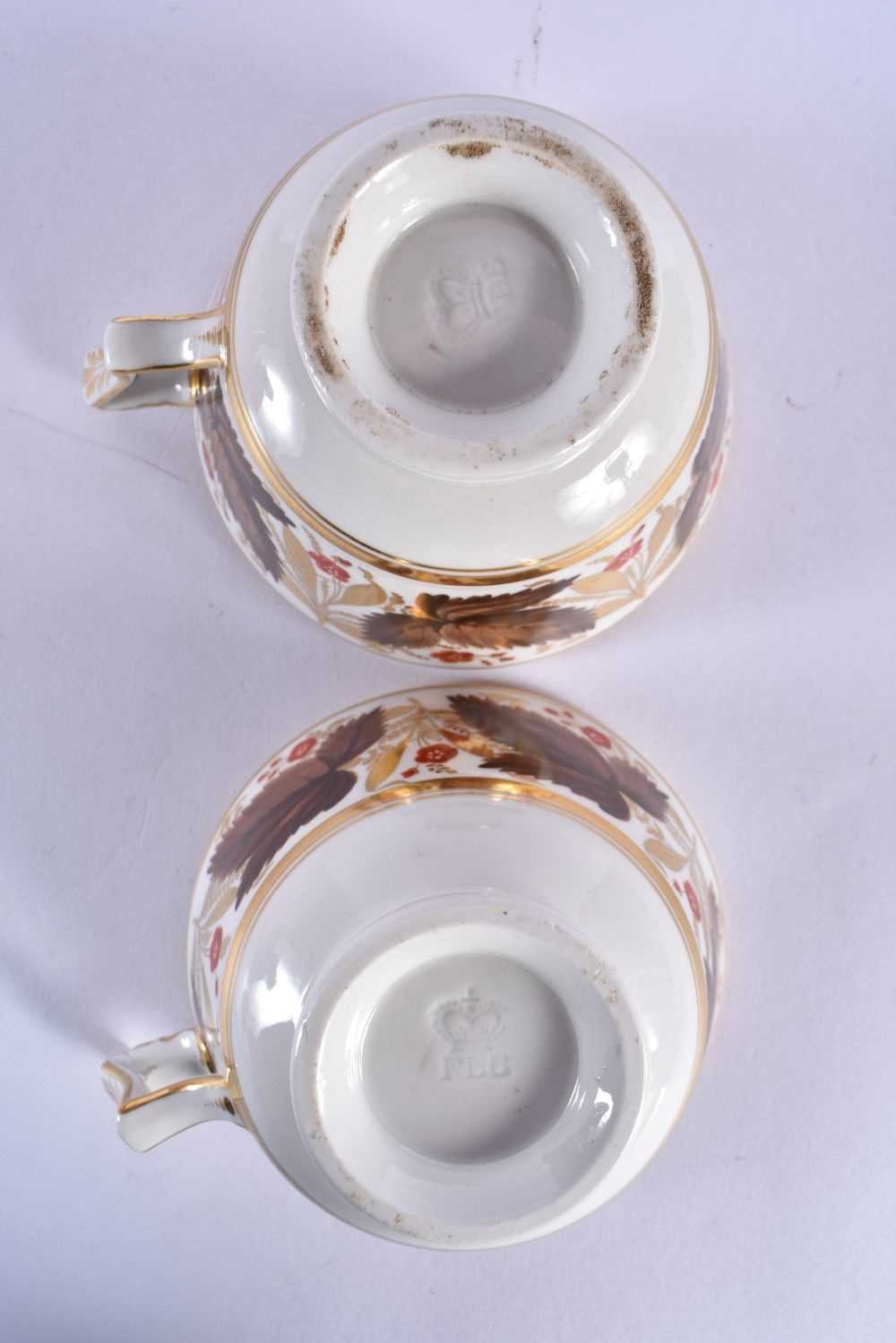 Flight Barr and Barr Worcester fine pair of cups and saucers painted with brown leaves and red - Image 7 of 7