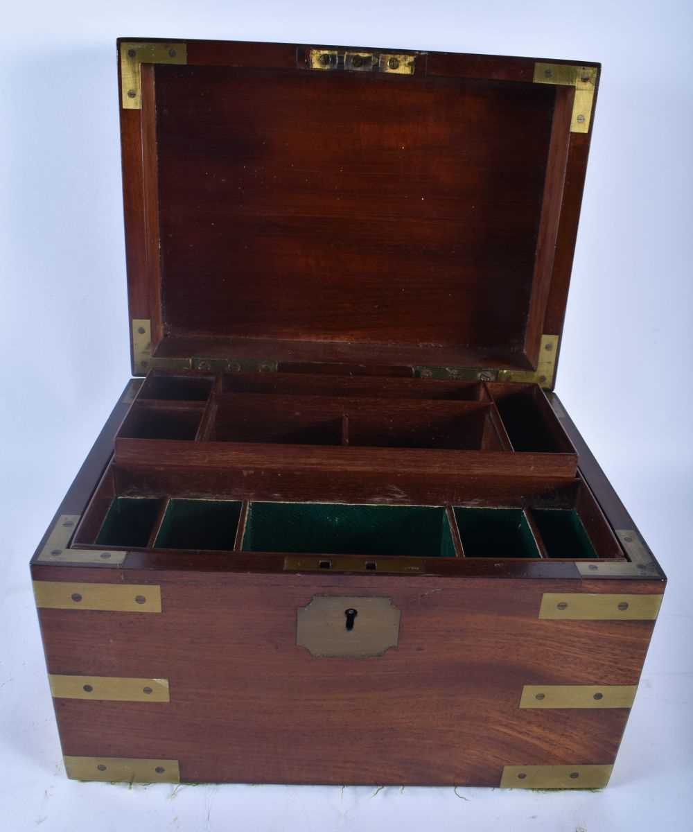 A RARE LARGE 19TH CENTURY MAHOGANY BRASS BOUND CAMPAIGN JEWELLERY BOX with fully fitted interior. 28 - Image 3 of 4