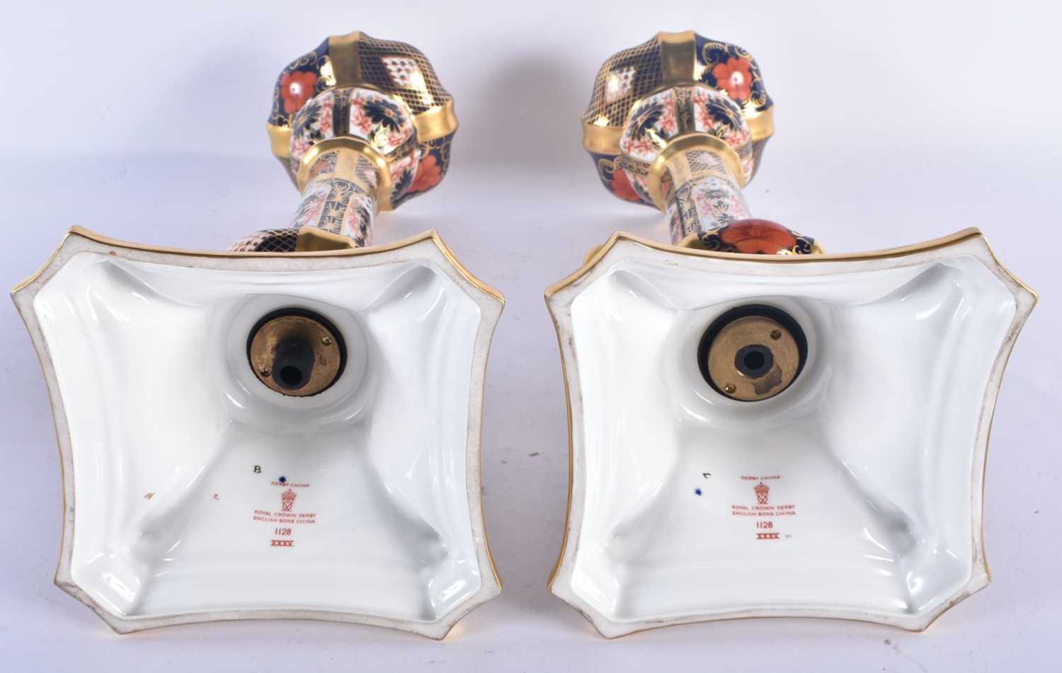 A LARGE PAIR OF ROYAL CROWN DERBY IMARI CANDLESTICKS. 27 cm high. - Image 4 of 6