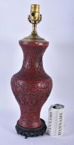 A LATE 19TH/20TH CENTURY CHINESE CARVED IMITATION CINNABAR LACQUER POTTERY LAMP Late Qing. 47 cm