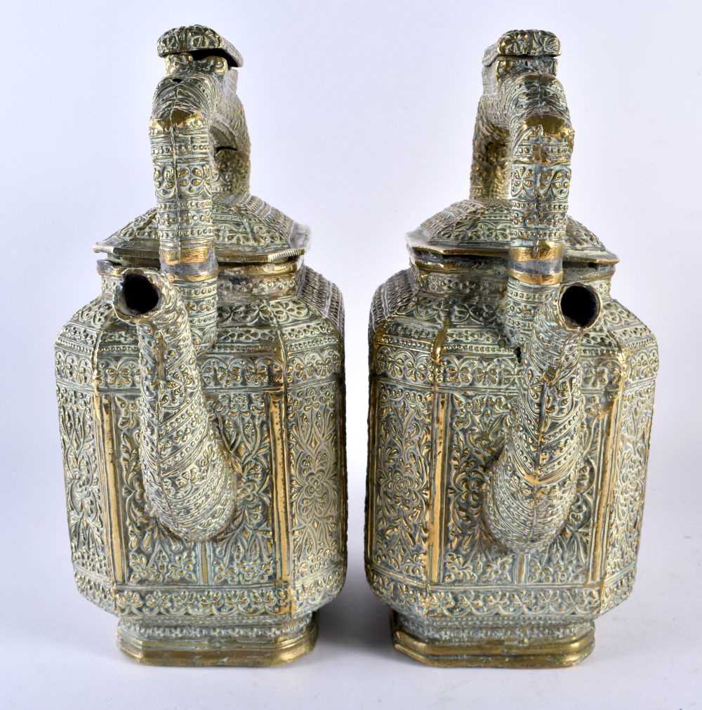 A LARGE PAIR OF 19TH CENTURY INDIAN BRONZE TEAPOTS AND COVERS decorated with floral sprays and - Image 2 of 6