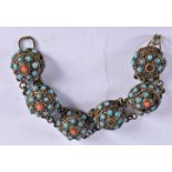 An Egyptian Bracelet set with Turquoise and Coral.16.5 cm long, weight 28.1g