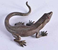 A Japanese Bronze Lizard with Gem Set Eyes. 9cm x 8 cm x 3 cm, weight 45g