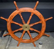 A Contemporary Wooden ship's wheel