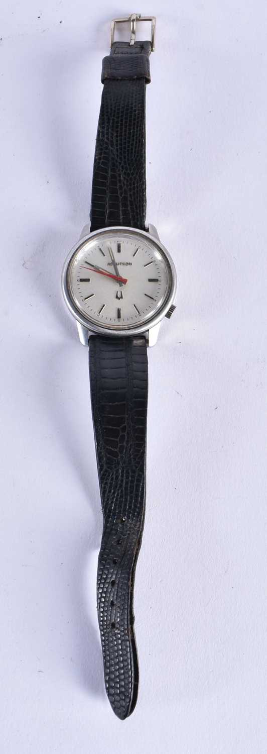 A ACCUTRON STAINLESS STEEL WRISTWATCH. 3.5 cm wide inc crown.