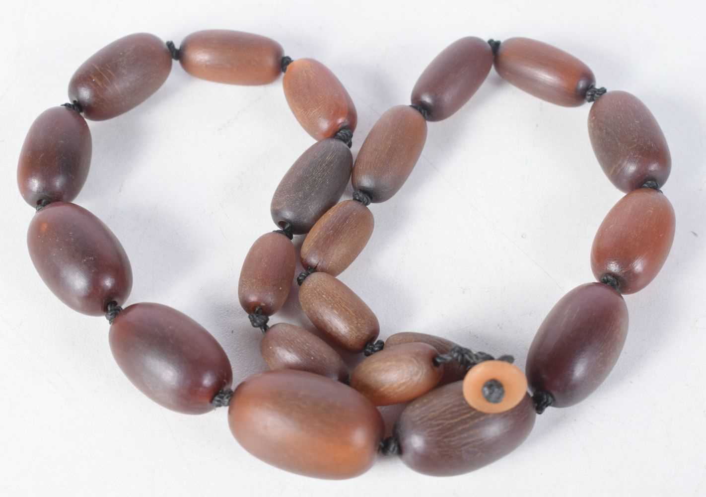 A 19TH CENTURY CHINESE CARVED RHINOCEROS HORN PRAYER BEAD NECKLACE Qing. 57.5 grams. 50 cm long,