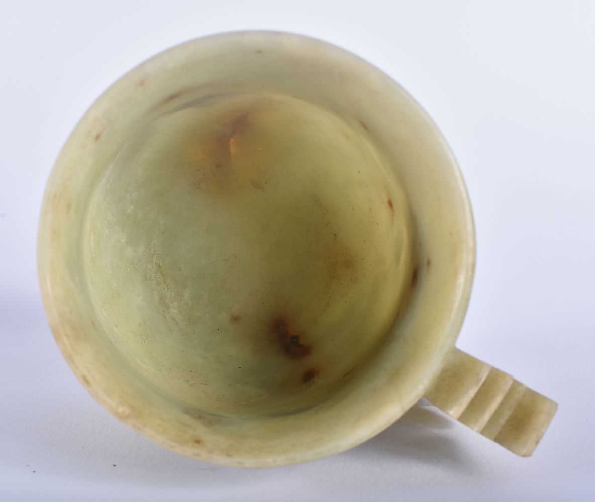 A LATE 19TH CENTURY CHINESE CARVED GREEN STONE CUP AND SAUCER possibly Jade. 12 cm diameter. (2) - Image 6 of 7