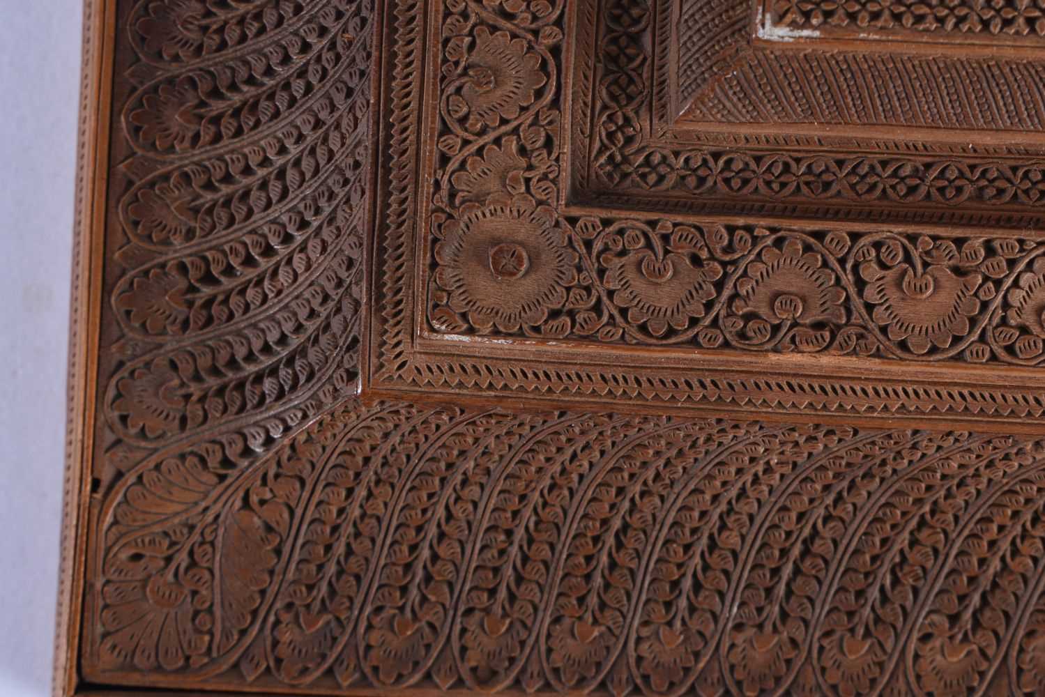 A FINE MID 19TH CENTURY ANGLO INDIAN CARVED WOOD CASKET AND COVER decorated with mythical birds, - Image 10 of 12