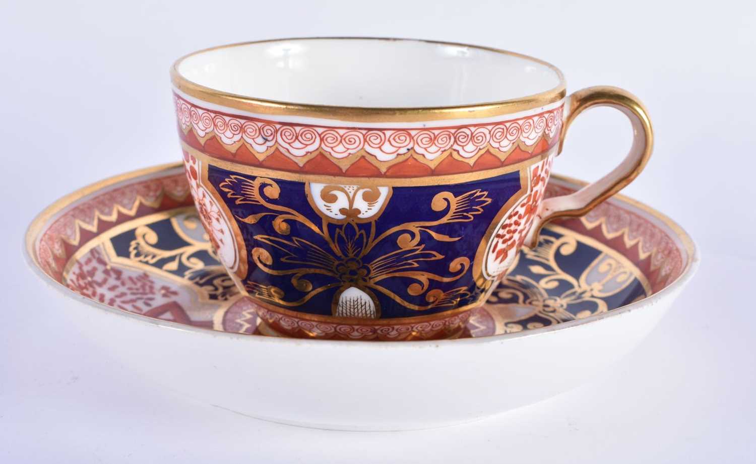 Spode teacup and saucer painted with the “Dollar” pattern and a saucer dish in the same pattern - Image 4 of 9