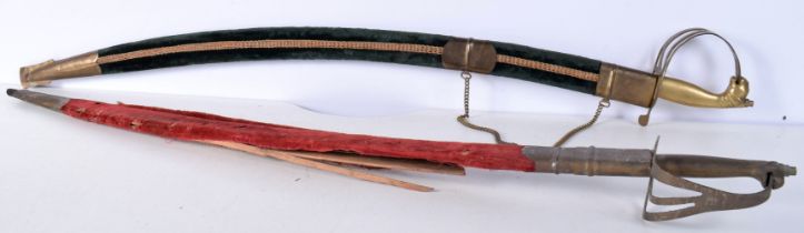 An early 20th Century Indian Talwar sword with brass grip and knuckle guard and textile covered
