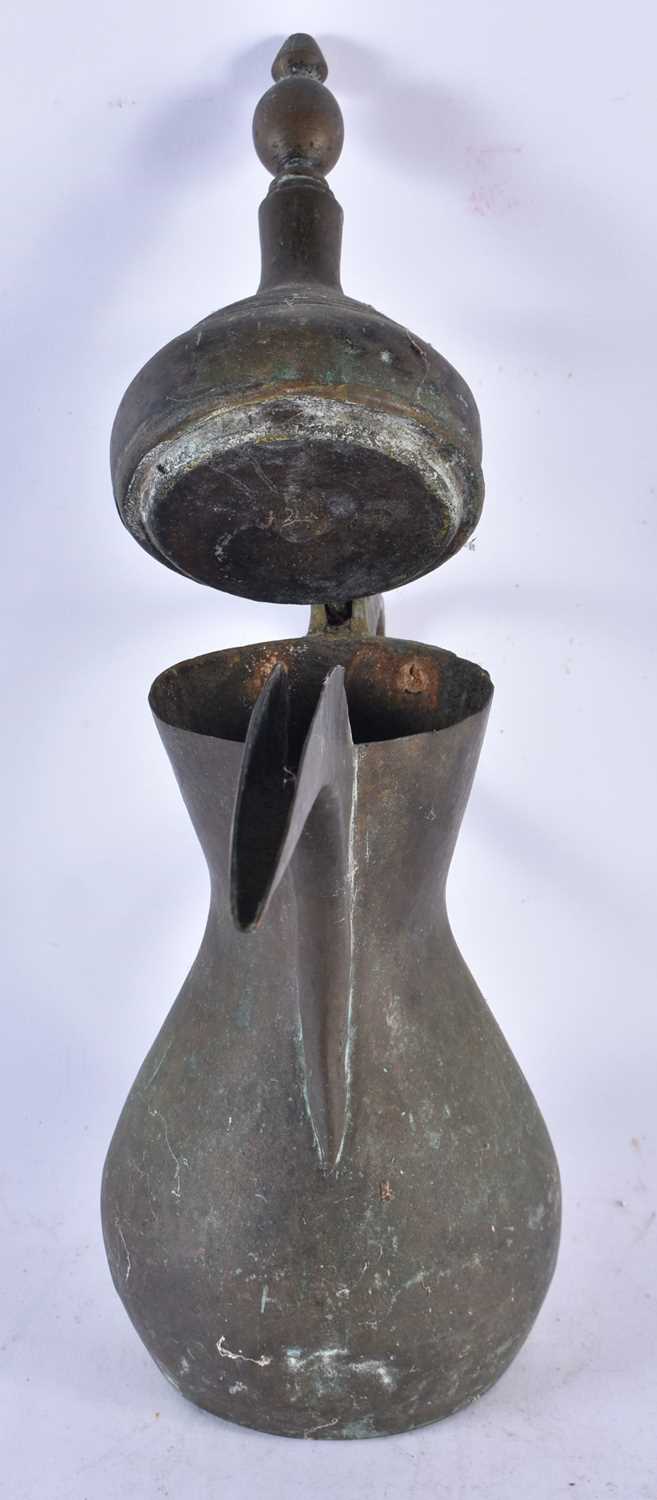 An Antique Arabic Middle Eastern Islamic Bedouin Dallah Coffee Pot.  40cm x 34cm x 14cm - Image 2 of 3