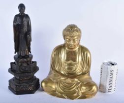 A LARGE 19TH CENTURY JAPANESE MEIJI PERIOD CARVED WOOD BUDDHA together with a smaller bronze buddha.