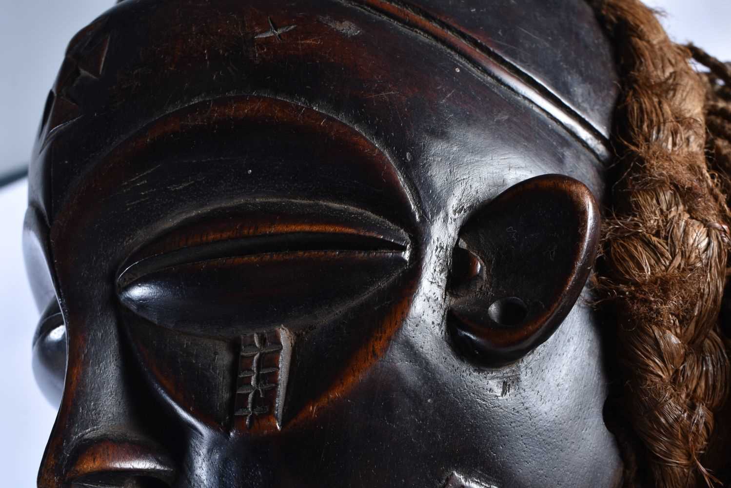 A LARGE EARLY 20TH CENTURY AFRICAN TRIBAL WOOD MASK with later stand. 58 cm x 14 cm. - Image 8 of 8