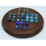 An antique Solitaire board with marbles 24 cm.