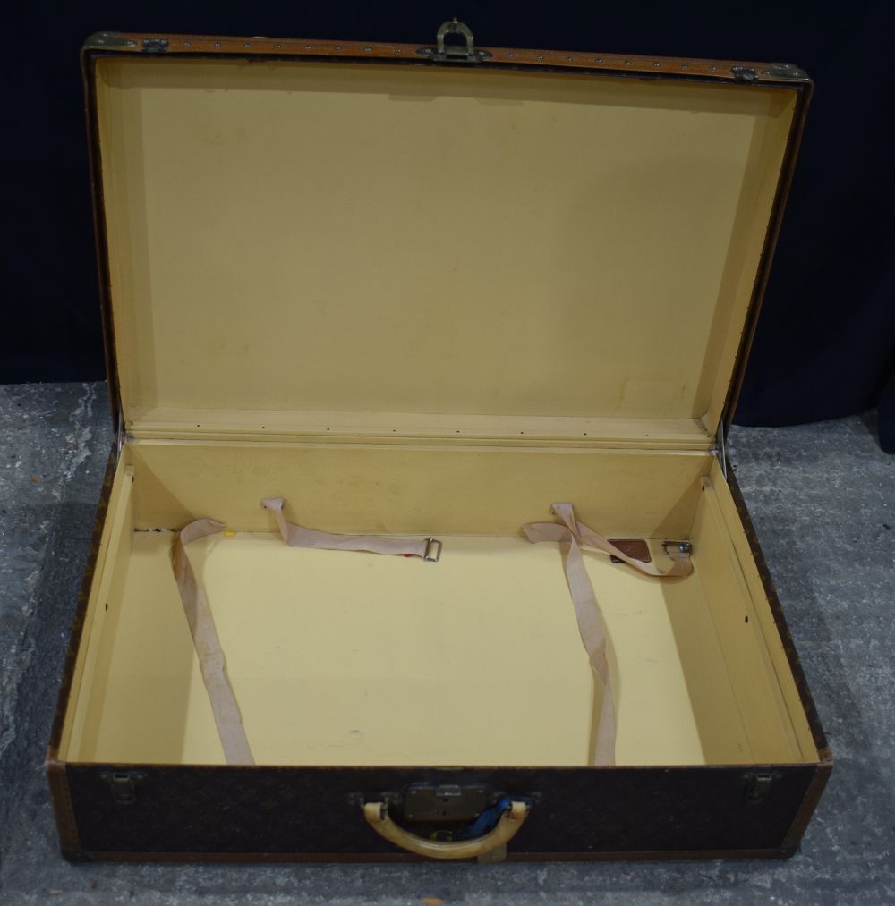 A Louis Vuitton suitcase 23 x 81 x 53 cm. - Image 13 of 14