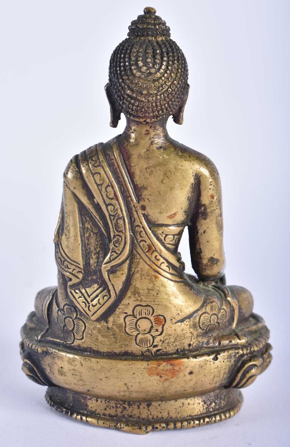 A 19TH CENTURY CHINESE BRONZE FIGURE OF A SEATED BUDDHA modelled upon a lotus capped base. 12 cm x 6 - Image 6 of 7